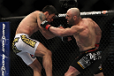 LAS VEGAS, NV - DECEMBER 30:  Manny Gamburyan (right) punches Diego Nunes (left) during the UFC 141 event at the MGM Grand Garden Arena on December 30, 2011 in Las Vegas, Nevada.  (Photo by Josh Hedges/Zuffa LLC/Zuffa LLC via Getty Images) *** Local Caption *** Manny Gamburyan; Diego Nunes
