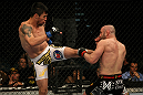 LAS VEGAS, NV - DECEMBER 30:  Diego Nunes (left) kicks Manny Gamburyan (right) during the UFC 141 event at the MGM Grand Garden Arena on December 30, 2011 in Las Vegas, Nevada.  (Photo by Donald Miralle/Zuffa LLC/Zuffa LLC via Getty Images) *** Local Caption *** Diego Nunes; Manny Gamburyan