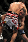 LAS VEGAS, NV - DECEMBER 30:  Jacob Volkmann (black shorts) attempts to take down Efrain Escudero (white shorts) during the UFC 141 event at the MGM Grand Garden Arena on December 30, 2011 in Las Vegas, Nevada.  (Photo by Josh Hedges/Zuffa LLC/Zuffa LLC via Getty Images) *** Local Caption *** Efrain Escudero; Jacob Volkmann