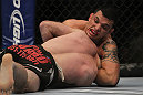 LAS VEGAS, NV - DECEMBER 30:  Efrain Escudero (top) attempts to submit Jacob Volkmann during the UFC 141 event at the MGM Grand Garden Arena on December 30, 2011 in Las Vegas, Nevada.  (Photo by Josh Hedges/Zuffa LLC/Zuffa LLC via Getty Images) *** Local Caption *** Efrain Escudero