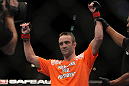 LAS VEGAS, NV - DECEMBER 30:  Jacob Volkmann is declared the winner in his fight against Efrain Escudero during the UFC 141 event at the MGM Grand Garden Arena on December 30, 2011 in Las Vegas, Nevada.  (Photo by Josh Hedges/Zuffa LLC/Zuffa LLC via Getty Images) *** Local Caption *** Jacob Volkmann