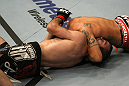 LAS VEGAS, NV - DECEMBER 30:  Efrain Escudero (right) attempts to submit Jacob Volkmann with a choke during the UFC 141 event at the MGM Grand Garden Arena on December 30, 2011 in Las Vegas, Nevada.  (Photo by Donald Miralle/Zuffa LLC/Zuffa LLC via Getty Images) *** Local Caption *** Efrain Escudero; Jacob Volkmann