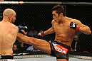 LAS VEGAS, NV - DECEMBER 30:  Dong Hyun Kim (right) throws a kick at Sean Pierson (left) during the UFC 141 event at the MGM Grand Garden Arena on December 30, 2011 in Las Vegas, Nevada.  (Photo by Donald Miralle/Zuffa LLC/Zuffa LLC via Getty Images) *** Local Caption *** Dong Hyun Kim; Sean Pierson
