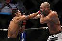 LAS VEGAS, NV - DECEMBER 30:  Dong Hyun Kim (left) and Sean Pierson (right) exchange punches during the UFC 141 event at the MGM Grand Garden Arena on December 30, 2011 in Las Vegas, Nevada.  (Photo by Josh Hedges/Zuffa LLC/Zuffa LLC via Getty Images) *** Local Caption *** Dong Hyun Kim; Sean Pierson