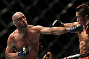 LAS VEGAS, NV - DECEMBER 30:  Sean Pierson (left) punches Dong Hyun Kim (right) during the UFC 141 event at the MGM Grand Garden Arena on December 30, 2011 in Las Vegas, Nevada.  (Photo by Josh Hedges/Zuffa LLC/Zuffa LLC via Getty Images) *** Local Caption *** Sean Pierson; Dong Hyun Kim