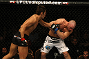 LAS VEGAS, NV - DECEMBER 30:  Dong Hyun Kim (left) punches Sean Pierson (right) during the UFC 141 event at the MGM Grand Garden Arena on December 30, 2011 in Las Vegas, Nevada.  (Photo by Donald Miralle/Zuffa LLC/Zuffa LLC via Getty Images) *** Local Caption *** Dong Hyun Kim; Sean Pierson