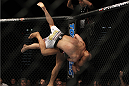 LAS VEGAS, NV - DECEMBER 30:  Dong Hyun Kim throws Sean Pierson (white shorts) down to the canvas during the UFC 141 event at the MGM Grand Garden Arena on December 30, 2011 in Las Vegas, Nevada.  (Photo by Josh Hedges/Zuffa LLC/Zuffa LLC via Getty Images) *** Local Caption *** Dong Hyun Kim; Sean Pierson