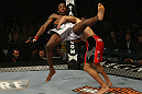 LAS VEGAS, NV - DECEMBER 30:  Danny Castillo (red shorts) slams Anthony Njokuani during the UFC 141 event at the MGM Grand Garden Arena on December 30, 2011 in Las Vegas, Nevada.  (Photo by Donald Miralle/Zuffa LLC/Zuffa LLC via Getty Images) *** Local Caption *** Anthony Njokuani; Danny Castillo