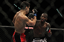 LAS VEGAS, NV - DECEMBER 30:  Anthony Njokuani (right) throws a punch at Danny Castillo (left) during the UFC 141 event at the MGM Grand Garden Arena on December 30, 2011 in Las Vegas, Nevada.  (Photo by Josh Hedges/Zuffa LLC/Zuffa LLC via Getty Images) *** Local Caption *** Anthony Njokuani; Danny Castillo