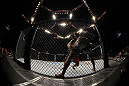 LAS VEGAS, NV - DECEMBER 30:  Danny Castillo (red shorts) attempts to secure a takedown on Anthony Njokuani (white shorts) during the UFC 141 event at the MGM Grand Garden Arena on December 30, 2011 in Las Vegas, Nevada.  (Photo by Josh Hedges/Zuffa LLC/Zuffa LLC via Getty Images) *** Local Caption *** Danny Castillo; Anthony Njokuani
