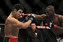 LAS VEGAS, NV - DECEMBER 30:  Anthony Njokuani (right) punches Danny Castillo (left) during the UFC 141 event at the MGM Grand Garden Arena on December 30, 2011 in Las Vegas, Nevada.  (Photo by Josh Hedges/Zuffa LLC/Zuffa LLC via Getty Images) *** Local Caption *** Anthony Njokuani; Danny Castillo
