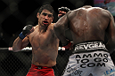 LAS VEGAS, NV - DECEMBER 30:  Danny Castillo (red shorts) throws a punch at Anthony Njokuani during the UFC 141 event at the MGM Grand Garden Arena on December 30, 2011 in Las Vegas, Nevada.  (Photo by Josh Hedges/Zuffa LLC/Zuffa LLC via Getty Images) *** Local Caption *** Danny Castillo; Anthony Njokuani