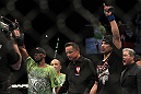 LAS VEGAS, NV - DECEMBER 30:  Danny Castillo (right, black shirt) and Anthony Njokuani (green shirt) await the results of their fight during the UFC 141 event at the MGM Grand Garden Arena on December 30, 2011 in Las Vegas, Nevada.  (Photo by Josh Hedges/Zuffa LLC/Zuffa LLC via Getty Images) *** Local Caption *** Danny Castillo; Anthony Njokuani