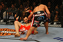 LAS VEGAS, NV - DECEMBER 30:  Johny Hendricks (black shorts) punches Jon Fitch during the UFC 141 event at the MGM Grand Garden Arena on December 30, 2011 in Las Vegas, Nevada.  (Photo by Donald Miralle/Zuffa LLC/Zuffa LLC via Getty Images) *** Local Caption *** Johny Hendricks; Jon Fitch