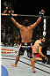 LAS VEGAS, NV - DECEMBER 30:  Johny Hendricks celebrates his knockout victory against Jon Fitch during the UFC 141 event at the MGM Grand Garden Arena on December 30, 2011 in Las Vegas, Nevada.  (Photo by Donald Miralle/Zuffa LLC/Zuffa LLC via Getty Images) *** Local Caption *** Johny Hendricks