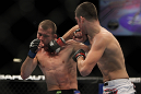 LAS VEGAS, NV - DECEMBER 30:  Nate Diaz (right) punches Donald Cerrone (left) during the UFC 141 event at the MGM Grand Garden Arena on December 30, 2011 in Las Vegas, Nevada.  (Photo by Josh Hedges/Zuffa LLC/Zuffa LLC via Getty Images) *** Local Caption *** Nate Diaz; Donald Cerrone