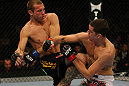 LAS VEGAS, NV - DECEMBER 30: Donald Cerrone (left) and Nate Diaz (right) exchange blows during the UFC 141 event at the MGM Grand Garden Arena on December 30, 2011 in Las Vegas, Nevada.  (Photo by Donald Miralle/Zuffa LLC/Zuffa LLC via Getty Images) *** Local Caption *** Donald Cerrone; Nate Diaz