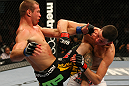 LAS VEGAS, NV - DECEMBER 30:  Donald Cerrone (left) hits Nate Diaz with a knee strike during the UFC 141 event at the MGM Grand Garden Arena on December 30, 2011 in Las Vegas, Nevada.  (Photo by Donald Miralle/Zuffa LLC/Zuffa LLC via Getty Images) *** Local Caption *** Donald Cerrone; Nate Diaz
