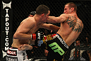 LAS VEGAS, NV - DECEMBER 30:  Donald Cerrone (right) and Nate Diaz (left) exchange blows during the UFC 141 event at the MGM Grand Garden Arena on December 30, 2011 in Las Vegas, Nevada.  (Photo by Donald Miralle/Zuffa LLC/Zuffa LLC via Getty Images) *** Local Caption *** Donald Cerrone; Nate Diaz