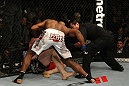 LAS VEGAS, NV - DECEMBER 30:  Alistair Overeem (white shorts) punches Brock Lesnar during the UFC 141 event at the MGM Grand Garden Arena on December 30, 2011 in Las Vegas, Nevada.  (Photo by Donald Miralle/Zuffa LLC/Zuffa LLC via Getty Images) *** Local Caption *** Alistair Overeem; Brock Lesnar