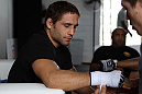 RIO DE JANEIRO, BRAZIL - JANUARY 11:  Chad Mendes has his hands wrapped before the UFC 142 Open Workouts at Barra de Tijuca Beach on January 11, 2012 in Rio de Janeiro, Brazil.  (Photo by Josh Hedges/Zuffa LLC/Zuffa LLC via Getty Images)