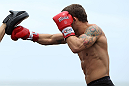 RIO DE JANEIRO, BRAZIL - JANUARY 11:  Chad Mendes works out for the media and fans during the UFC 142 Open Workouts at Barra de Tijuca Beach on January 11, 2012 in Rio de Janeiro, Brazil.  (Photo by Josh Hedges/Zuffa LLC/Zuffa LLC via Getty Images)