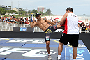 RIO DE JANEIRO, BRAZIL - JANUARY 11:  Jose Aldo works out for the media and fans during the UFC 142 Open Workouts at Barra de Tijuca Beach on January 11, 2012 in Rio de Janeiro, Brazil.  (Photo by Josh Hedges/Zuffa LLC/Zuffa LLC via Getty Images)