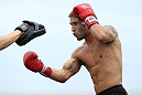 RIO DE JANEIRO, BRAZIL - JANUARY 11:  Chad Mendes works out for the media and fans during the UFC 142 Open Workouts at Barra de Tijuca Beach on January 11, 2012 in Rio de Janeiro, Brazil.  (Photo by Josh Hedges/Zuffa LLC/Zuffa LLC via Getty Images)