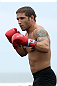 RIO DE JANEIRO, BRAZIL - JANUARY 11:  Chad Mendes works out for the media and fans during the UFC 142 Open Workouts at Barra de Tijuca Beach on January 11, 2012 in Rio de Janeiro, Brazil.  (Photo by Josh Hedges/Zuffa LLC/Zuffa LLC via Getty Images)