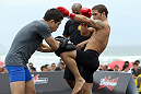 RIO DE JANEIRO, BRAZIL - JANUARY 11:  Chad Mendes works out for the media and fans during the UFC 142 Open Workouts at Barra de Tijuca Beach on January 11, 2012 in Rio de Janeiro, Brazil.  (Photo by Josh Hedges/Zuffa LLC/Zuffa LLC via Getty Images)