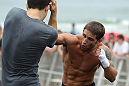 RIO DE JANEIRO, BRAZIL - JANUARY 11:  Chad Mendes works out for the media and fans during the UFC 142 Open Workouts at Barra de Tijuca Beach on January 11, 2012 in Rio de Janeiro, Brazil.  (Photo by Josh Hedges/Zuffa LLC/Zuffa LLC via Getty Images)
