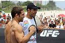 RIO DE JANEIRO, BRAZIL - JANUARY 11:  (R-L) UFC Featherweight Champion Jose Aldo and challenger Chad Mendes pose for photos during the UFC 142 Open Workouts at Barra de Tijuca Beach on January 11, 2012 in Rio de Janeiro, Brazil.  (Photo by Josh Hedges/Zuffa LLC/Zuffa LLC via Getty Images)