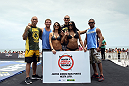 RIO DE JANEIRO, BRAZIL - JANUARY 11:  (L-R) Wanderlei Silva, Gray Maynard, Arianny Celeste, Junior dos Santos, Chandella Powell, and Diego Brandao pose for a photo during the UFC 142 Open Workouts at Barra de Tijuca Beach on January 11, 2012 in Rio de Janeiro, Brazil.  (Photo by Josh Hedges/Zuffa LLC/Zuffa LLC via Getty Images)