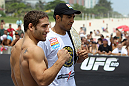 RIO DE JANEIRO, BRAZIL - JANUARY 11:  (R-L) UFC Featherweight Champion Jose Aldo and challenger Chad Mendes pose for photos during the UFC 142 Open Workouts at Barra de Tijuca Beach on January 11, 2012 in Rio de Janeiro, Brazil.  (Photo by Josh Hedges/Zuffa LLC/Zuffa LLC via Getty Images)