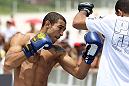 RIO DE JANEIRO, BRAZIL - JANUARY 11:  Jose Aldo works out for the media and fans during the UFC 142 Open Workouts at Barra de Tijuca Beach on January 11, 2012 in Rio de Janeiro, Brazil.  (Photo by Josh Hedges/Zuffa LLC/Zuffa LLC via Getty Images)