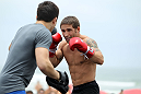 RIO DE JANEIRO, BRAZIL - JANUARY 11:  Chad Mendes works out for the media and fans during the UFC 142 Open Workouts at Barra de Tijuca Beach on January 11, 2012 in Rio de Janeiro, Brazil.  (Photo by Josh Hedges/Zuffa LLC/Zuffa LLC via Getty Images)