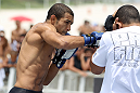 RIO DE JANEIRO, BRAZIL - JANUARY 11:  Jose Aldo works out for the media and fans during the UFC 142 Open Workouts at Barra de Tijuca Beach on January 11, 2012 in Rio de Janeiro, Brazil.  (Photo by Josh Hedges/Zuffa LLC/Zuffa LLC via Getty Images)
