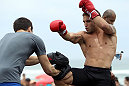 RIO DE JANEIRO, BRAZIL - JANUARY 11:  Chad Mendes works out for the media and fans during the UFC 142 Open Workouts at Barra de Tijuca Beach on January 11, 2012 in Rio de Janeiro, Brazil.  (Photo by Josh Hedges/Zuffa LLC/Zuffa LLC via Getty Images)
