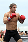 RIO DE JANEIRO, BRAZIL - JANUARY 11:  Chad Mendes works out for the media and fans during the UFC 142 Open Workouts at Barra de Tijuca Beach on January 11, 2012 in Rio de Janeiro, Brazil.  (Photo by Josh Hedges/Zuffa LLC/Zuffa LLC via Getty Images)