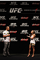 RIO DE JANEIRO, BRAZIL - JANUARY 13:  (L-R) UFC Heavyweight Champion Junior dos Santos and UFC host Paula Sack interact with fans during a Q&A session before the UFC 142 Weigh In at HSBC Arena on January 13, 2012 in Rio de Janeiro, Brazil.  (Photo by Josh Hedges/Zuffa LLC/Zuffa LLC via Getty Images)