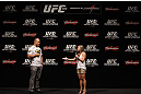 RIO DE JANEIRO, BRAZIL - JANUARY 13:  (L-R) UFC Heavyweight Champion Junior dos Santos and UFC host Paula Sack interact with fans during a Q&A session before the UFC 142 Weigh In at HSBC Arena on January 13, 2012 in Rio de Janeiro, Brazil.  (Photo by Josh Hedges/Zuffa LLC/Zuffa LLC via Getty Images)