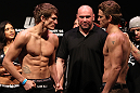 RIO DE JANEIRO, BRAZIL - JANUARY 13:  (L-R) Opponents Ricardo Funch and Mike Pyle face off after weighing in during the UFC 142 Weigh In at HSBC Arena on January 13, 2012 in Rio de Janeiro, Brazil.  (Photo by Josh Hedges/Zuffa LLC/Zuffa LLC via Getty Images)