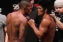 RIO DE JANEIRO, BRAZIL - JANUARY 13:  (L-R) Opponents Yuri Alcantara and Michihiro Omigawa face off after weighing in during the UFC 142 Weigh In at HSBC Arena on January 13, 2012 in Rio de Janeiro, Brazil.  (Photo by Josh Hedges/Zuffa LLC/Zuffa LLC via Getty Images)