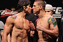 RIO DE JANEIRO, BRAZIL - JANUARY 13:  (L-R) Opponents Erick Silva and Carlo Prater face off after weighing in during the UFC 142 Weigh In at HSBC Arena on January 13, 2012 in Rio de Janeiro, Brazil.  (Photo by Josh Hedges/Zuffa LLC/Zuffa LLC via Getty Images)