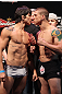 RIO DE JANEIRO, BRAZIL - JANUARY 13:  (L-R) Opponents Erick Silva and Carlo Prater face off after weighing in during the UFC 142 Weigh In at HSBC Arena on January 13, 2012 in Rio de Janeiro, Brazil.  (Photo by Josh Hedges/Zuffa LLC/Zuffa LLC via Getty Images)