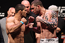 RIO DE JANEIRO, BRAZIL - JANUARY 13:  (L-R) Rousimar Palhares and Mike Massenzio face off after weighing in during the UFC 142 Weigh In at HSBC Arena on January 13, 2012 in Rio de Janeiro, Brazil.  (Photo by Josh Hedges/Zuffa LLC/Zuffa LLC via Getty Images)