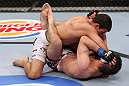 RIO DE JANEIRO, BRAZIL - JANUARY 14:  Felipe Arantes (Top) punches Antonio Carvalho (Bottom) in a featherweight bout during UFC 142 at HSBC Arena on January 14, 2012 in Rio de Janeiro, Brazil.  (Photo by Josh Hedges/Zuffa LLC/Zuffa LLC via Getty Images)