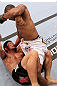 RIO DE JANEIRO, BRAZIL - JANUARY 14:  Yuri Alcantara (Top) punches on top of Michihiro Omigawa (Bottom) in a featherweight bout during UFC 142 at HSBC Arena on January 14, 2012 in Rio de Janeiro, Brazil.  (Photo by Josh Hedges/Zuffa LLC/Zuffa LLC via Getty Images)