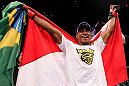 RIO DE JANEIRO, BRAZIL - JANUARY 14:  Yuri Alcantara celebrates after defeating Michihiro Omigawa in a featherweight bout during UFC 142 at HSBC Arena on January 14, 2012 in Rio de Janeiro, Brazil.  (Photo by Josh Hedges/Zuffa LLC/Zuffa LLC via Getty Images)
