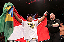RIO DE JANEIRO, BRAZIL - JANUARY 14:  Yuri Alcantara celebrates after defeating Michihiro Omigawa in a featherweight bout during UFC 142 at HSBC Arena on January 14, 2012 in Rio de Janeiro, Brazil.  (Photo by Josh Hedges/Zuffa LLC/Zuffa LLC via Getty Images)